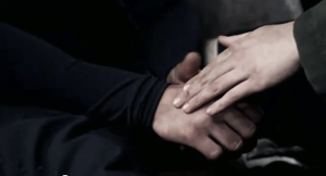 Katniss and Peeta in cave for Hunger Games